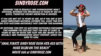 Anal pirate Sindy Rose ruin her rear-end with giant dildo on the beach